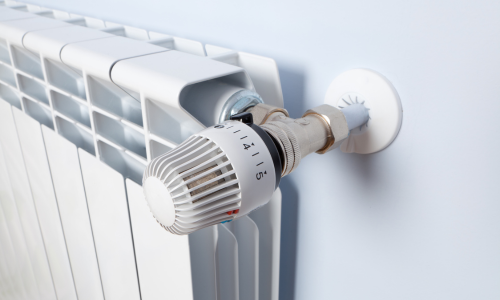 A close-up of a radiators dial. 