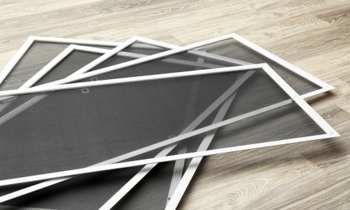 A stack of window screens.